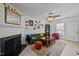 Cozy living room featuring a fireplace and lots of wall decor at 103 Friar Ln, Carrboro, NC 27510
