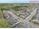 An aerial view of the home in a community that features mature trees, landscaping, and a shopping center nearby at 111 Wards Ridge Dr, Cary, NC 27513