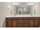 Large bathroom features a double sink vanity and mirrors at 111 Wards Ridge Dr, Cary, NC 27513