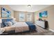 Staged main bedroom with a calming color scheme, decor, and good natural light from two windows at 111 Wards Ridge Dr, Cary, NC 27513