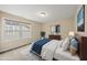 Nicely staged bedroom featuring calming color palette and natural light creating a relaxing atmosphere at 111 Wards Ridge Dr, Cary, NC 27513