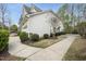 A view of the exterior showing the white siding and landscaping at 111 Wards Ridge Dr, Cary, NC 27513