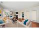 Comfortable living room featuring hardwood floors, fireplace, and an open floor plan at 111 Wards Ridge Dr, Cary, NC 27513