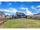 Large fenced backyard with lush lawn offers plenty of room to roam at 1160 Duke Farm Dr, Wake Forest, NC 27587