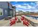 Backyard patio with outdoor dining, a fire pit, and a built in grill at 1160 Duke Farm Dr, Wake Forest, NC 27587