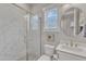 Bathroom featuring glass shower door, marble tile and vanity at 1160 Duke Farm Dr, Wake Forest, NC 27587