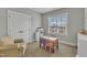 Bright bedroom featuring table and chair with nice window view at 1160 Duke Farm Dr, Wake Forest, NC 27587