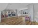 Large bonus room, features both carpet and LVP flooring, with multiple seating areas at 1160 Duke Farm Dr, Wake Forest, NC 27587