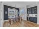 Dining room with decorative paneled accent wall, and stylish built-in beverage center at 1160 Duke Farm Dr, Wake Forest, NC 27587