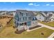Charming two-story home with a covered porch, landscaped yard, and inviting curb appeal at 1160 Duke Farm Dr, Wake Forest, NC 27587