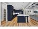 Spacious kitchen with large island, stainless appliances, and open floor plan at 1160 Duke Farm Dr, Wake Forest, NC 27587