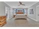 Spacious main bedroom with wood furniture, a ceiling fan, and neutral decor at 1160 Duke Farm Dr, Wake Forest, NC 27587