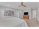 Main bedroom showcasing a ceiling fan, a chest of drawers, and ensuite access at 1160 Duke Farm Dr, Wake Forest, NC 27587