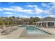 Community pool featuring lounge chairs, a shallow end, and a slide at 1160 Duke Farm Dr, Wake Forest, NC 27587