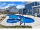 A backyard pool with attached spa, surrounded by an ample patio at 1160 Duke Farm Dr, Wake Forest, NC 27587