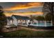Charming backyard featuring an in-ground pool and a fire pit, perfect for outdoor entertaining at 124 Holly Ridge Ln, Mebane, NC 27302