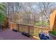 Balcony with lush greenery and distant views, perfect for relaxation and enjoying nature at 125 Long Shadow Pl, Durham, NC 27713