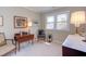 Bright bedroom with comfortable chairs, large window, and curated decor at 125 Long Shadow Pl, Durham, NC 27713
