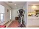 This exercise room features a treadmill, tiled floor, and a kitchenette for added convenience at 125 Long Shadow Pl, Durham, NC 27713