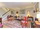 Spacious living room with hardwood floors, fireplace, and a staircase at 125 Long Shadow Pl, Durham, NC 27713