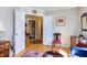 Living room with hardwood floors, oriental rug, and entryway at 125 Long Shadow Pl, Durham, NC 27713