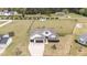 Inviting two-story home featuring a two-car garage, landscaping, and spacious yard, perfect for Gathering living at 127 Hurricane Aly, Benson, NC 27504