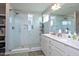 Modern bathroom featuring glass-enclosed shower, dual sinks, and stylish finishes at 127 Hurricane Aly, Benson, NC 27504