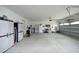Large garage with storage solutions, and ample space for multiple vehicles at 127 Hurricane Aly, Benson, NC 27504