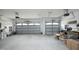 Spacious two-car garage with high ceilings and ample storage space at 127 Hurricane Aly, Benson, NC 27504