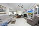 Cozy living room featuring a fireplace, plush seating, ceiling fan and open floor plan at 127 Hurricane Aly, Benson, NC 27504