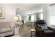 Connected living space with an open layout with kitchen bar and dining space at 127 Hurricane Aly, Benson, NC 27504