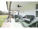 Covered patio with outdoor furniture for relaxing and enjoying the backyard at 127 Hurricane Aly, Benson, NC 27504
