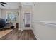 Hallway featuring hardwood floors, a front door, and an office at 128 School Side Dr, Spring Lake, NC 28390