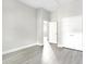 Spacious bedroom with luxury vinyl floors, large closet and neutral paint to make personalization a breeze at 129 Burwell Avenue Ave, Henderson, NC 27536