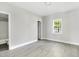 Well-lit bedroom with natural light and fresh paint provides a calming, relaxing atmosphere at 129 Burwell Avenue Ave, Henderson, NC 27536