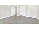 Spacious bedroom with luxury vinyl floors, and closet providing ample storage space at 129 Burwell Avenue Ave, Henderson, NC 27536