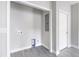 Functional laundry room with utility connections, ready for washer and dryer installation at 129 Burwell Avenue Ave, Henderson, NC 27536