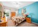 Bright bedroom with natural light, ceiling fan, and wooden furniture at 1312 Golden Bluff Ln, Fuquay Varina, NC 27526