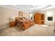Primary bedroom with en-suite bath, a king bed and a large window for natural light at 1312 Golden Bluff Ln, Fuquay Varina, NC 27526