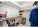 Walk-in closet with built-in shelving to maximize storage and organization at 1312 Golden Bluff Ln, Fuquay Varina, NC 27526
