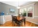 Bright dining area with beautiful natural light from the backyard at 1312 Golden Bluff Ln, Fuquay Varina, NC 27526