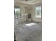 This room features two windows that provide natural light, enhancing the home's appeal and character at 141 N Bullock St, Henderson, NC 27536