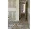 A hallway shows how the home is currently undergoing renovations at 141 N Bullock St, Henderson, NC 27536