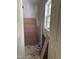 The hallway of the home is currently being renovated at 141 N Bullock St, Henderson, NC 27536