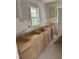 Kitchen undergoing renovation, showcasing new cabinets at 141 N Bullock St, Henderson, NC 27536