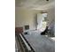 Living room undergoing renovations, filled with natural light and renovation materials at 141 N Bullock St, Henderson, NC 27536