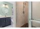 Bathroom view with a shower, vanity, and soaking tub at 1550 Pathway Dr, Carrboro, NC 27510
