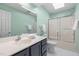 Bathroom with a shower over tub and a sink with plenty of counter space at 1550 Pathway Dr, Carrboro, NC 27510