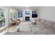 Cozy living room featuring a fireplace, built-in shelving, and ample seating at 1550 Pathway Dr, Carrboro, NC 27510
