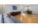 Open-concept living area with a comfortable sofa and seamless access to the dining room at 1550 Pathway Dr, Carrboro, NC 27510